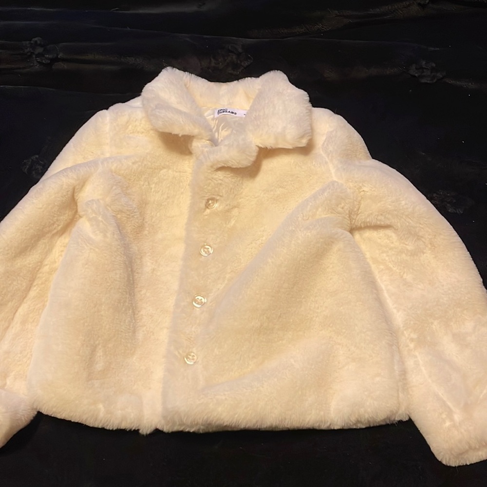 Ivory Todd faux fur coat
